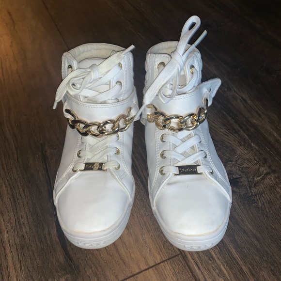 white shoes with gold chain